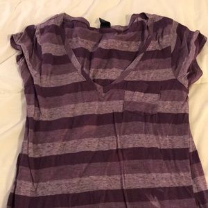 V neck purple shirt.